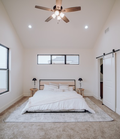 Handyman installing a ceiling fixture